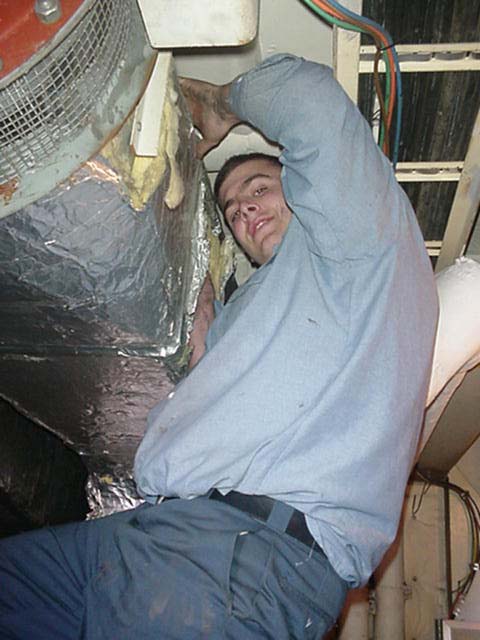 Mr. Fixit: 2/c Brian White (Hingham,MA) makes repairs as part of the Maintenance Division.