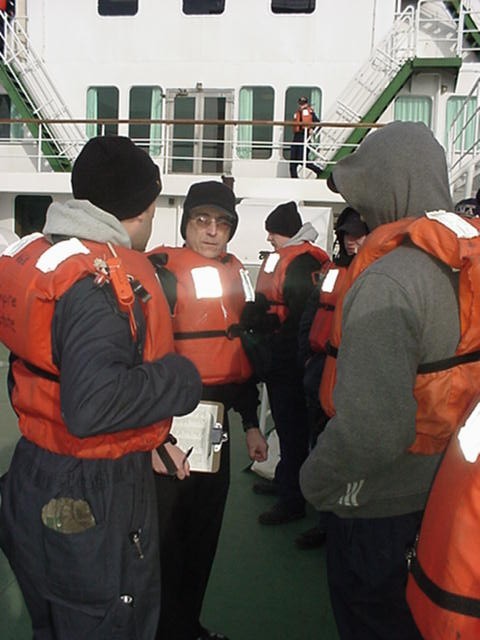 Lt. Horan: a lifeboat mustering officer counts the cadets in lifeboat #5 for the fire and boat drill.