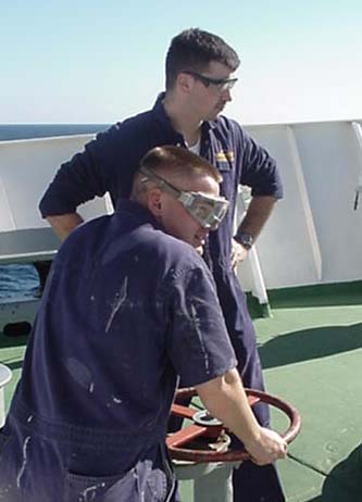 brake: 1/c David Boulanger (Sommerset, MA) stands by to release the anchor, 1/c Eric Jacobson (Foxboro,MA)looks on.
