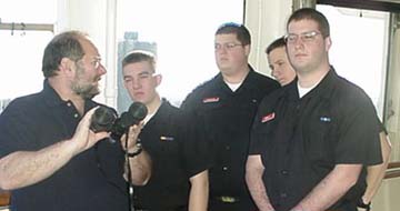 bridge watch: Captain Joe Murphy instructs the bridge watch in the fine points of watchkeeping aboard TSES