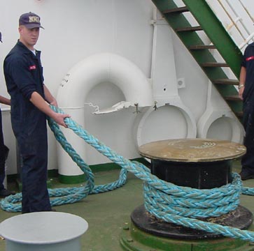 working with lines: a 4/c cadet demonstrates how to safely handle mooring lines to pass his STCW assessment