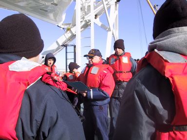 Boat Drill BBay: Capt. Jerry McGourthy takes muster at lifeboat number 1.