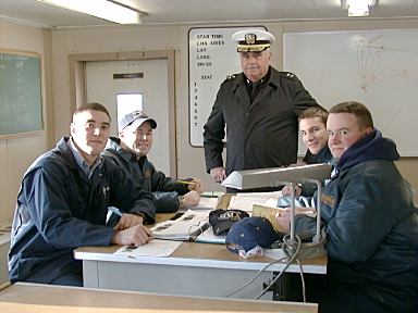 Admiral in cadet chartroom.: Admiral Bresnehan checks to make sure we know where we're going.