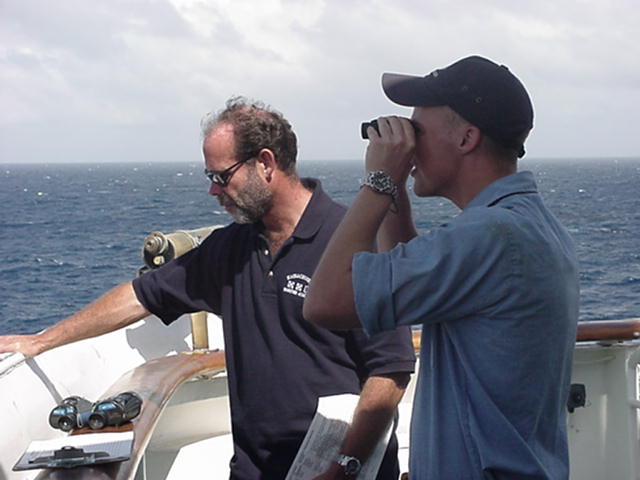 Weiss.jpg: Lcdr Pete Weiss, Navigator aboard Empire State, and 4/c Cadet Schildt on the bridge.