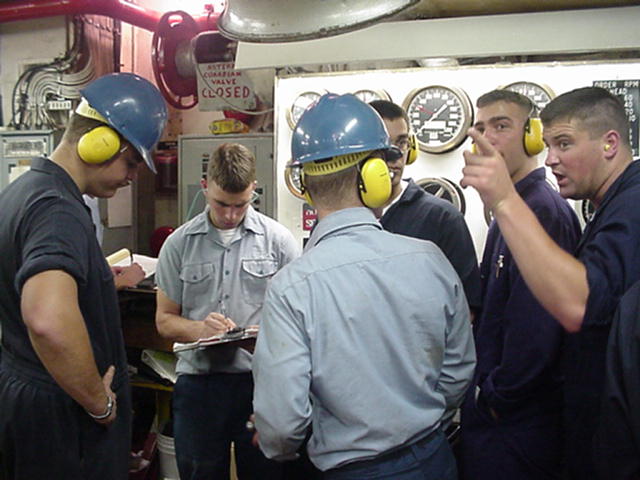 engine room classes: The temp is 100 degrees, the humidity is off the chart, the noise is deafening, and lip reading is a valuable skill. Such is a classroom in the real world aboard TSES. 