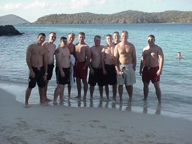 men at the beach: "Air conditioning... who cares about air conditioning... life's a beach here in St. Thomas!"